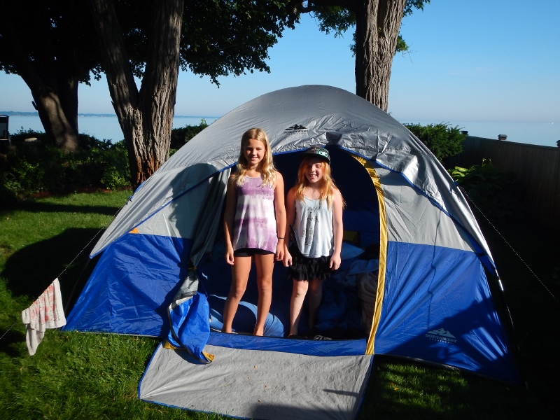 2015 Madi and friend Skyler camp out in out
        front yard