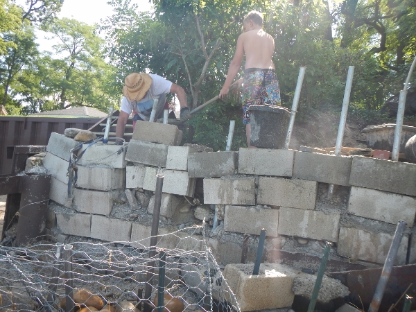 2019 Aug 21 Barrett and Grampa working on the Wall