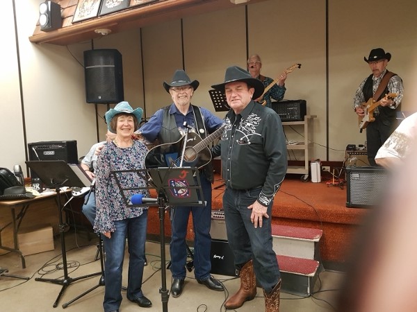 2019 Kathy and I pose with Kenny Jay at the Petrolia
            Country Jamboree