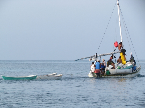 Belize Fishermen depart early
                morning from SW Cay Glovers Reef