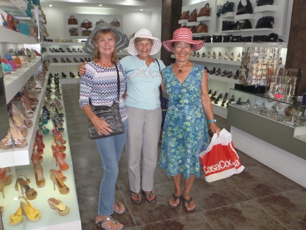 The
        Ladies go hat shopping in Guatemala City
